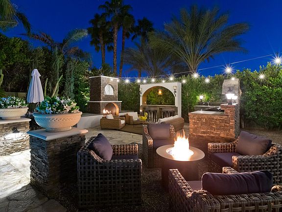 Firepit and fireplace with custom barbeque