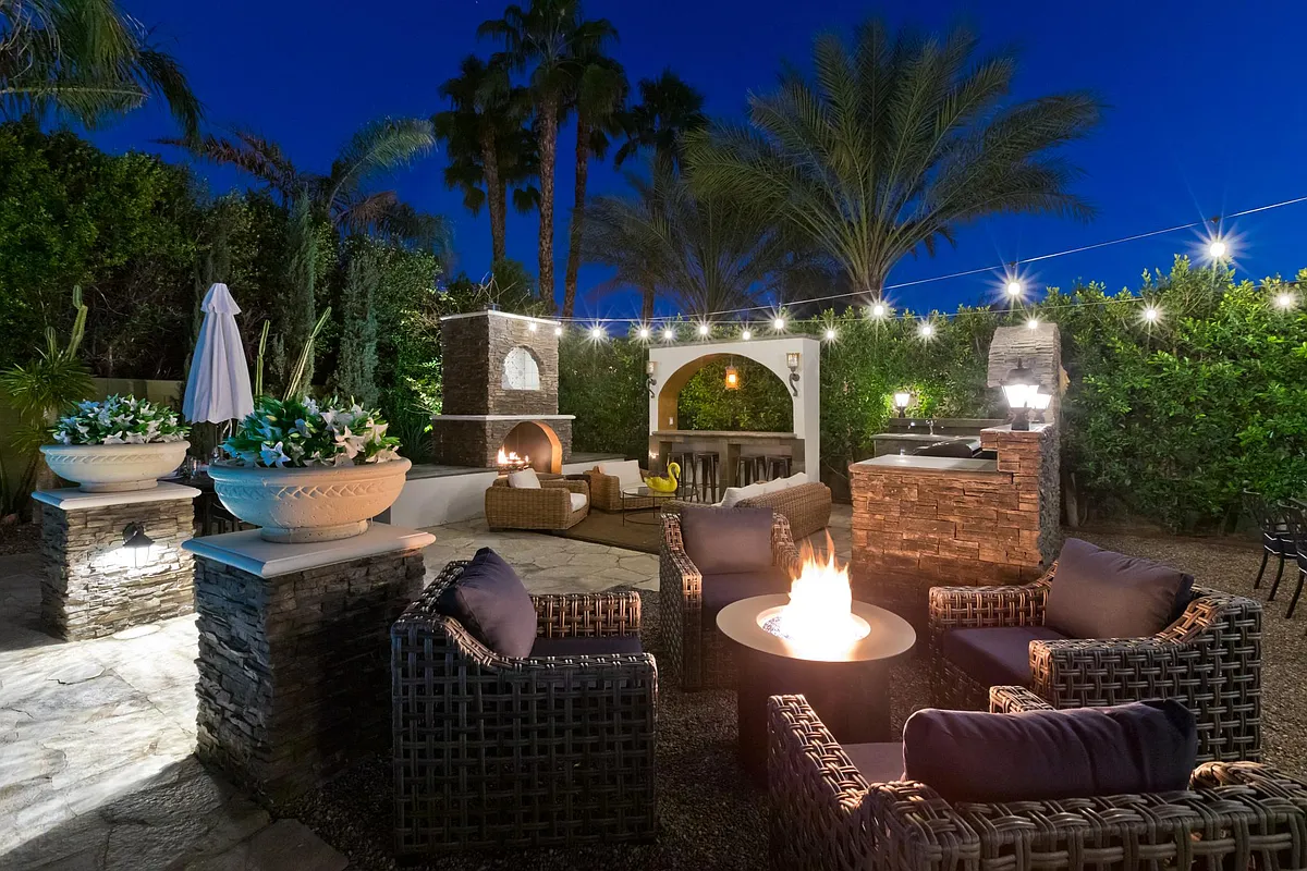 Firepit and fireplace with custom barbeque - 48760 Pear St