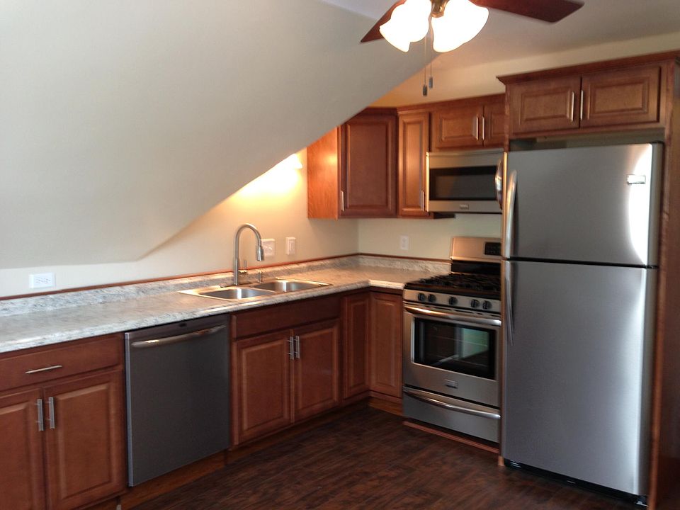 Kitchen with full size stainless steel appliances