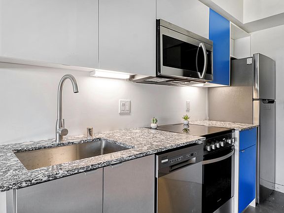 5th image of 3910 Centre St #300