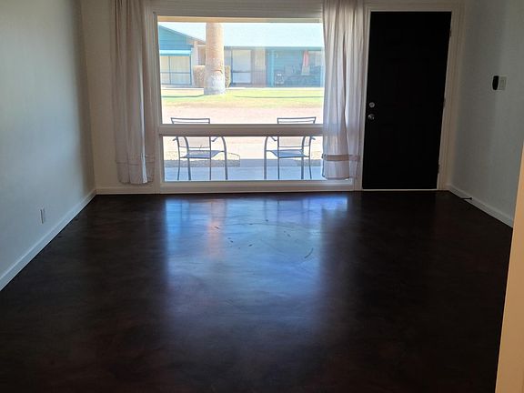 Living room area looking out from kitchen