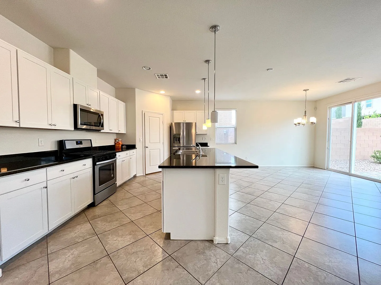 Welcome to this stunning 5-bedroom, 3-bathroom home with 1 bedroom and bath down — Photo 3