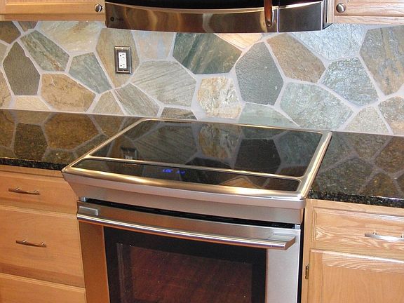 Electrolux Stove/Oven, GE SpaceMaker Microwave.