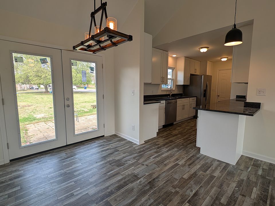 Open concept floor plan. Top to bottom rehab, including new windows and screens throughout the home, new cabinets, new SS appliances, lighting and ceiling fans, LVT flooring, & French doors to the backyard. Clean, modern and comfortable living space!