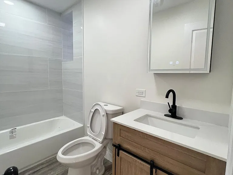 174 E 54th St #1 — Photo 12