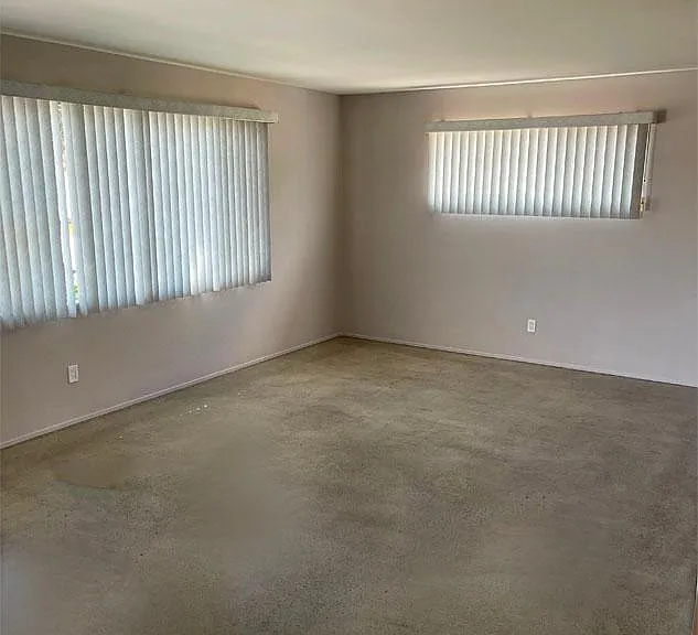 Living Room. Large left window faces street and right window faces cul-de-sac.