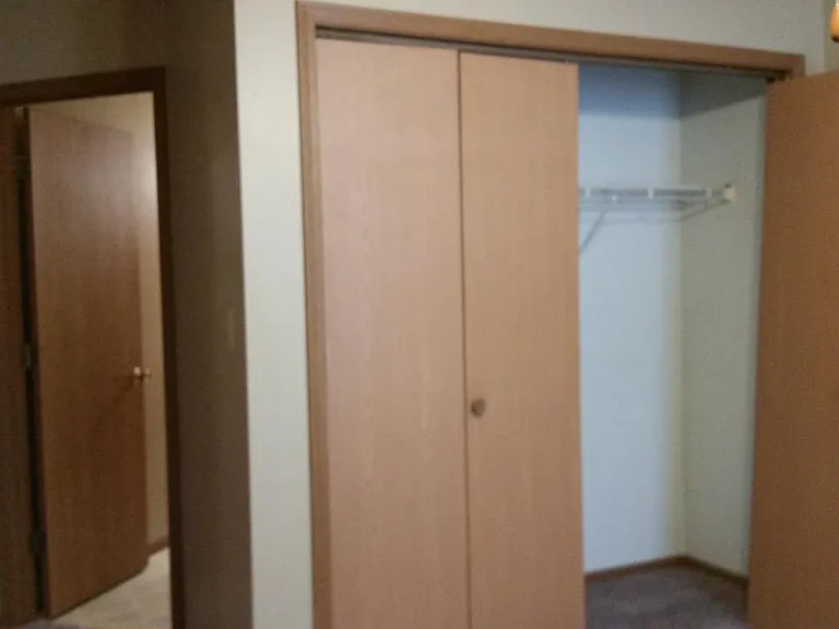master suite from window, master closet and bath doors
