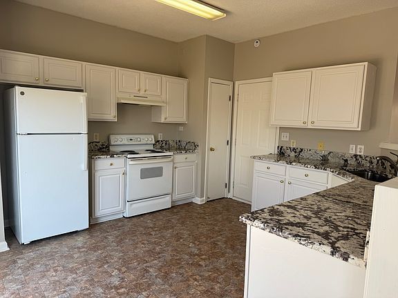 Kitchen with Granite Countertop.