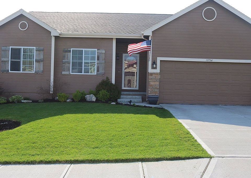 11734 S. 210th St.