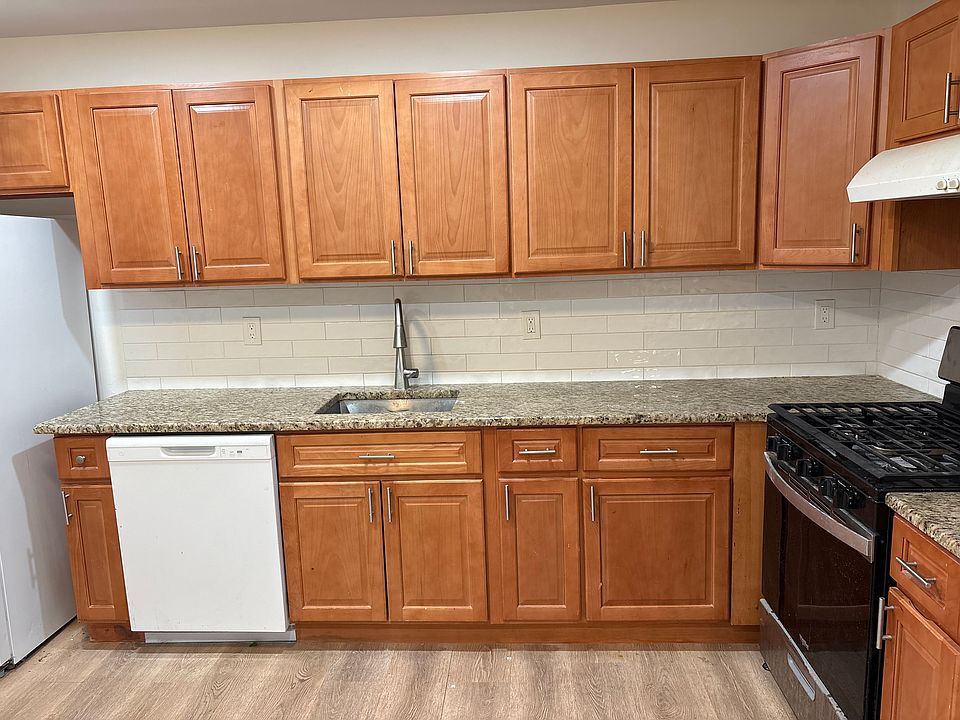recently remodeled kitchen with granite countertops.