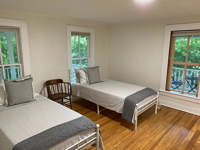 Upstairs east bedroom can be made into two twin beds or one king.