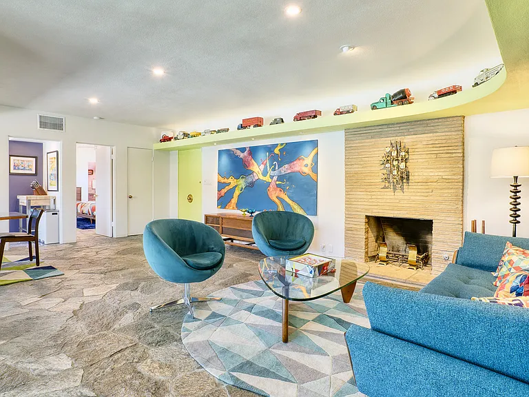 Great room with view to kitchen and master bedroom.