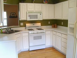 Kitchen with Hardwood Floors ~ Refrigerator Stays!