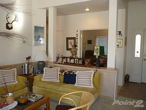 living room looking towards bonus room