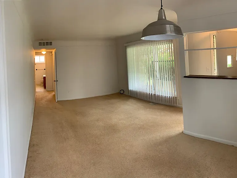 From Entrance, Living Room, Dinning Area and Hall way to rooms