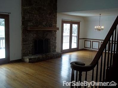 Living Room
						:
						Floor to Ceiling Mountain Stone Fireplace. Hardwood Floors. French Doors.