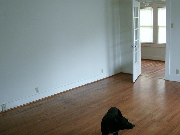 LIVING ROOM SHOWING SUN ROOM DOOR