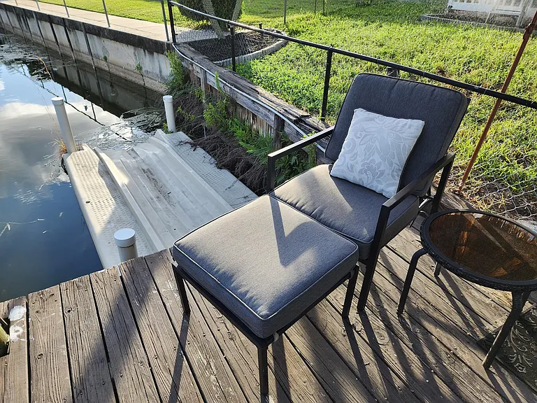 Great floating dock to the left. Easy access and storage for lake toys like jet skis. Nice for lounging with a cocktail on a lazy day!