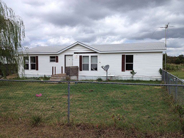 Cute mobile on 10 acres with easy access to I-44