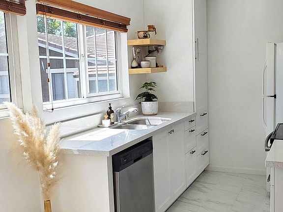 NEW KITCHEN CABINETS with outlet in the pantry to put your microwave. 4 additional outlets on each section of the counter