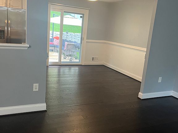 View of Dining Room and Door to back patio from Living Room.