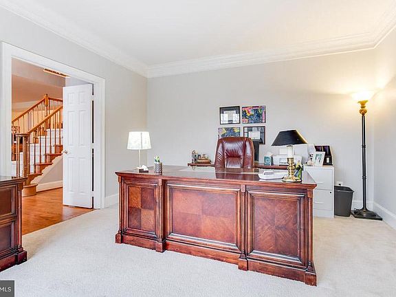 Main level home office to the right of home foyer