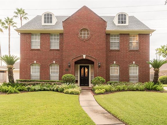 Stately Emerald home that spells magic inside and out. Gable windows add more glory to this beautifully maintained home.