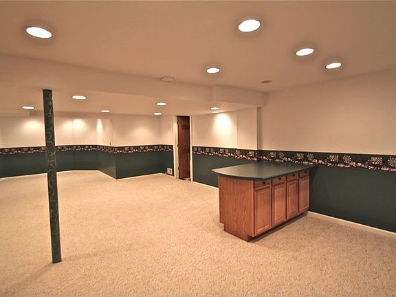 HUGE Finished Lower Level Theatre Area