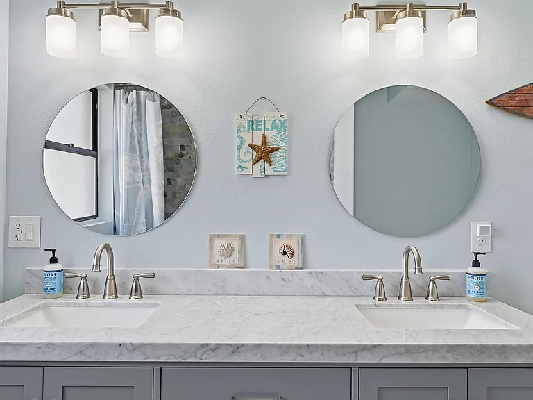 Brand new bathroom with marble double vanity - just outside the bedrooms.