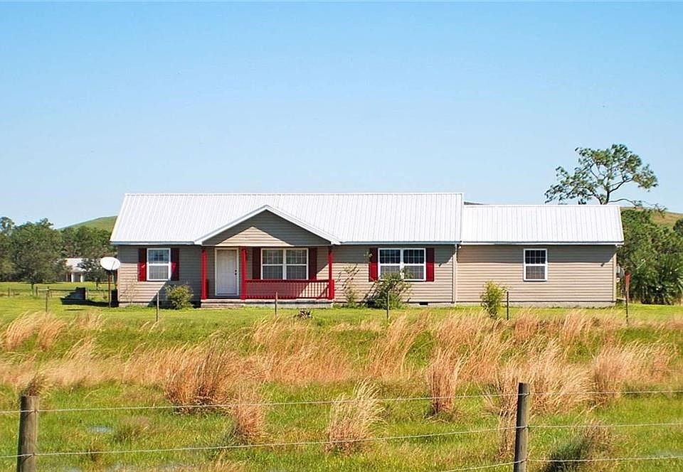 Peaceful County Living on 41.99 acres in this wonderful 3 Bedroom, 2 Bah home with oversized 2 car garage.