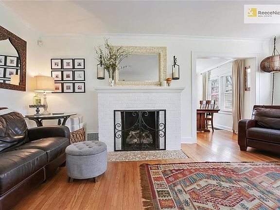 Charming living room with awesome mantel and gas insert