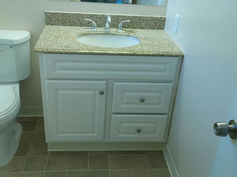 REMODELED BATHROOM WITH TUB AND SHOWER