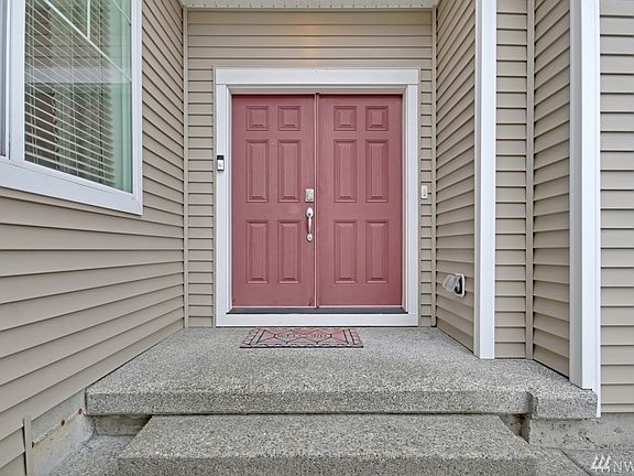 Double door entry w/ Ring camera that stays with home.