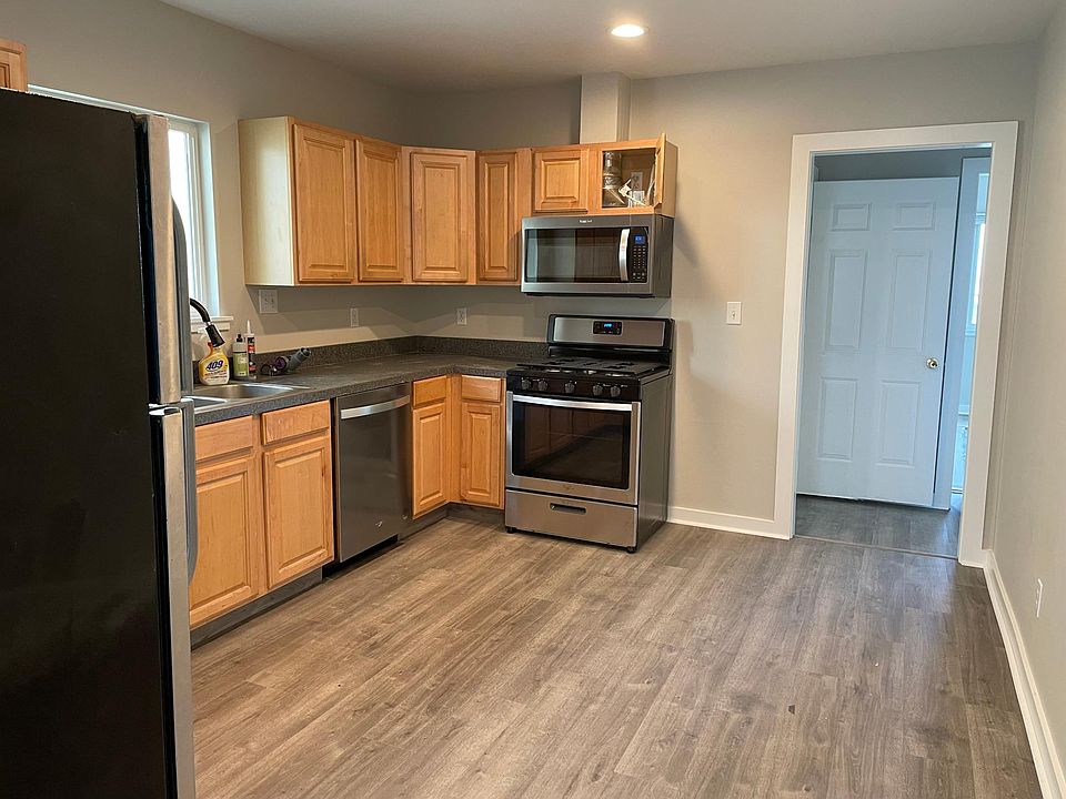 Kitchen with brand new stainless steel appliances and as stove!