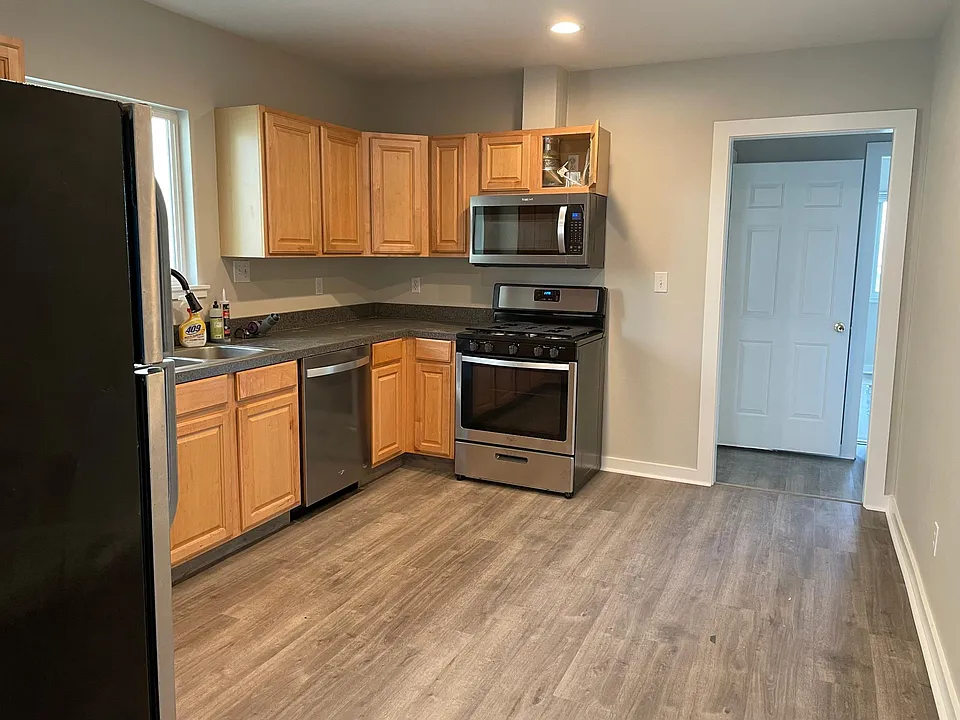 Kitchen with brand new stainless steel appliances and as stove!