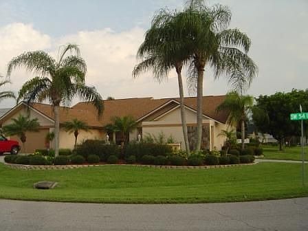 beautifully landscaped corner lot on end of street