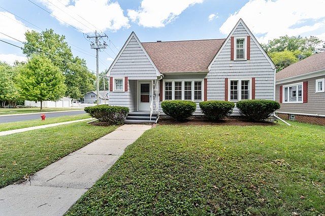 ~Home sits on a corner lot on a quiet tree lined street.