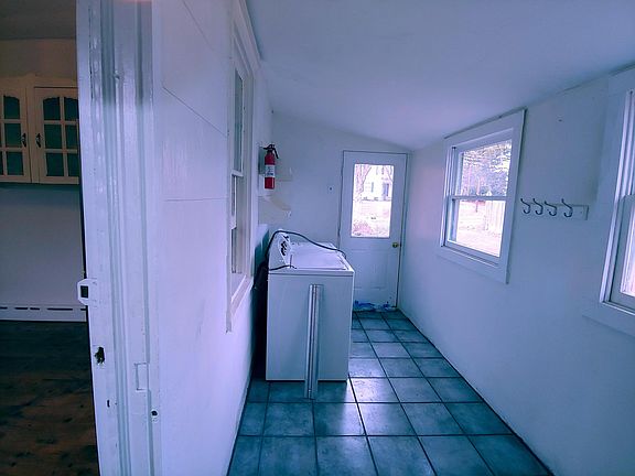 Mudroom with laundry and separate door