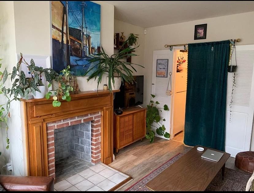 Front room: dining/living room as styled by previous tenant