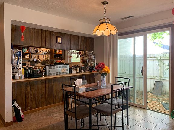 Porcelain tile in kitchen, laundry and dining area