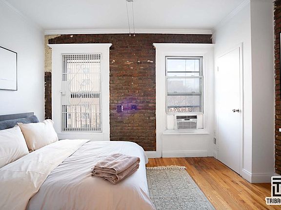 5th image of 103 E 2nd St APT 5
