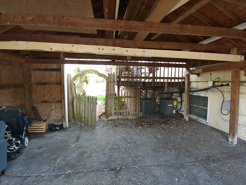 Inside Carport + Gate to Yar