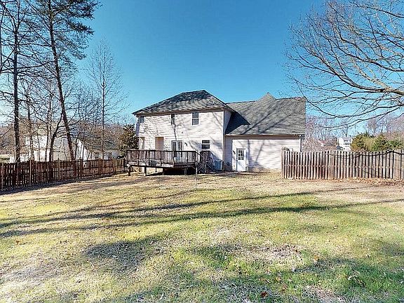 B.Yard extends beyond fence