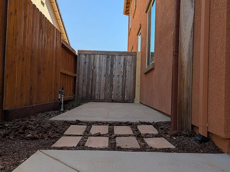This pet-friendly low-maintenance outdoor space is perfect for enjoying fresh air right outside your door. Updated with convenient mounting clip on the fence, perfect for easily hanging string lights, plants, or outdoor decor.