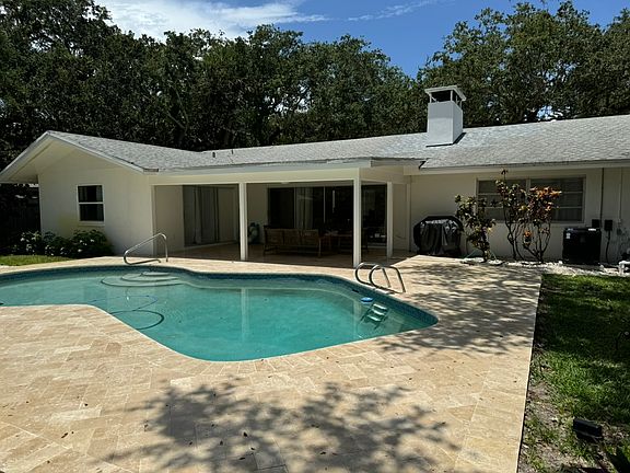 ...the heated pool and covered lanai and bbq...