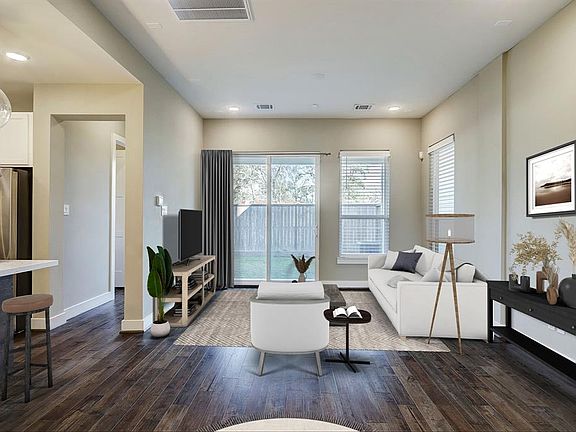 Virtually Staged - This is currently setup as the living area but could also be the dining area.