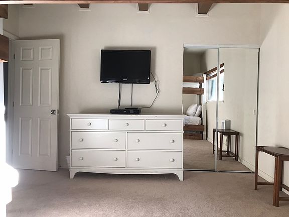 This TV is now much bigger...hang out area upstairs with bunks.