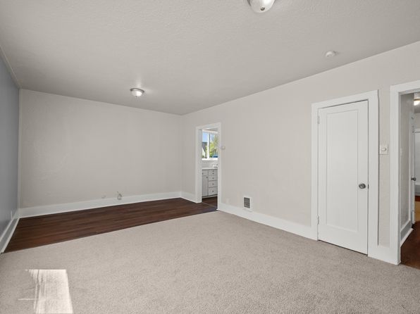 215 E 1st St APT 206