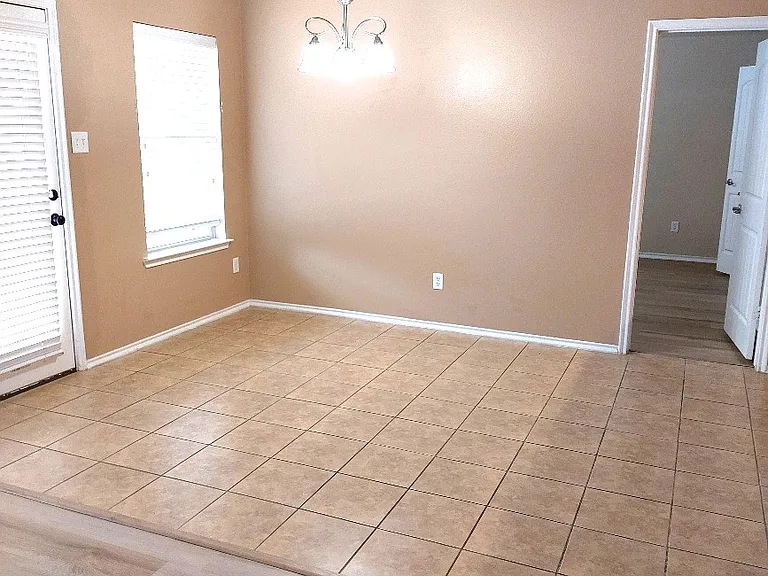 Breakfast nook off living room and kitchen. Home has a wonderful layout & feels like a NEW HOME.
