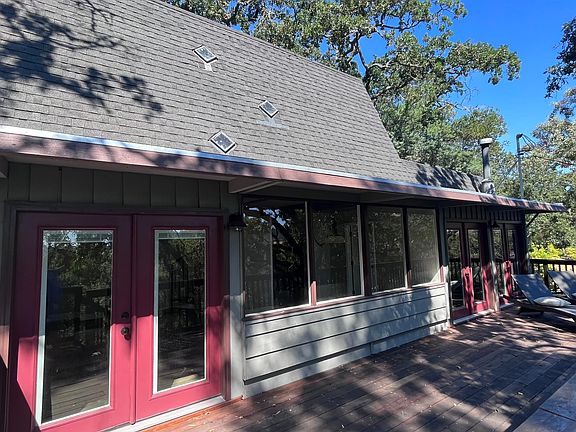 Large deck / entrance into front door - up one flight of stairs